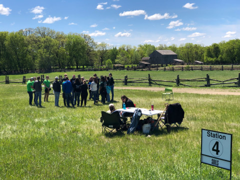 Photo: A station about soils at the 2026 Metro Area Envirothon.